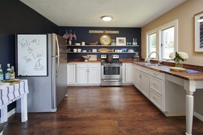 Fully stocked kitchen .