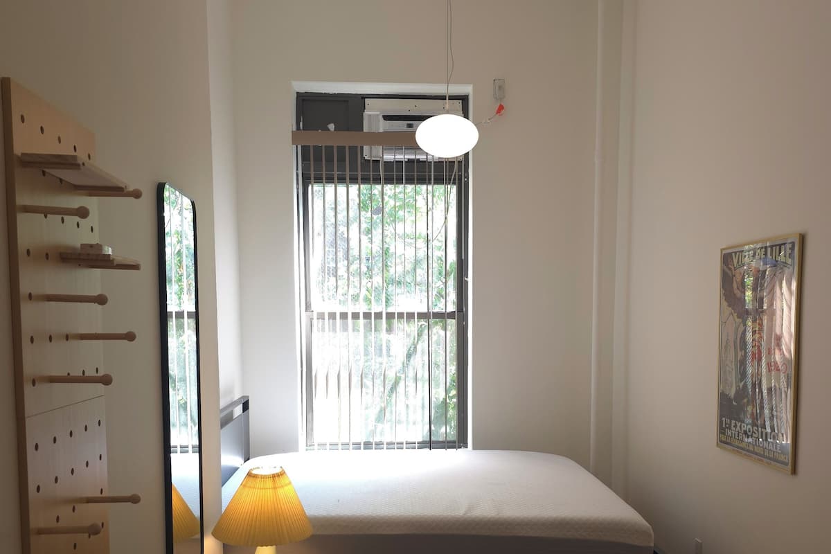 Blackout curtains, soundproofing, iron/ironing board (on request)