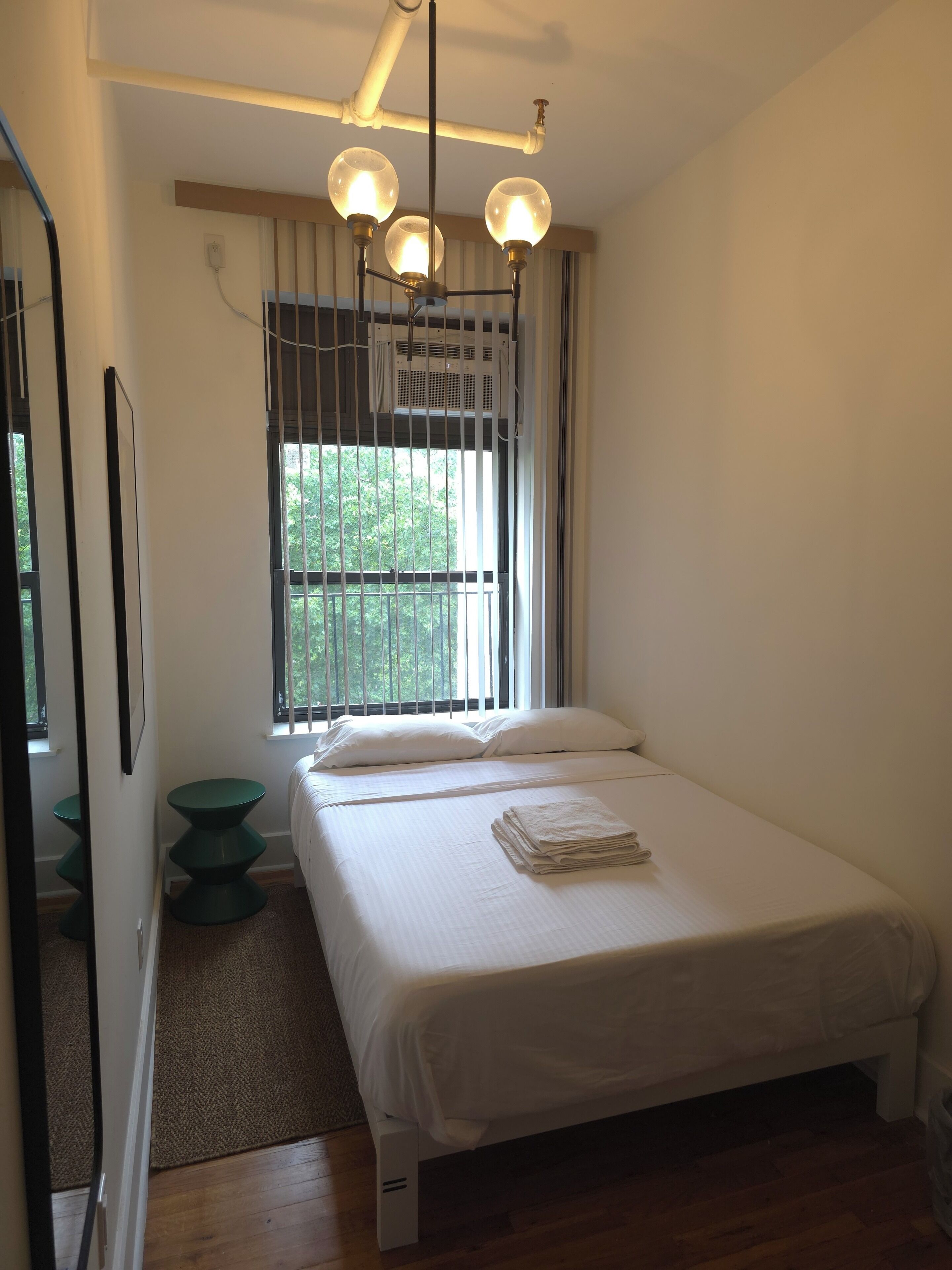 Blackout drapes, soundproofing, iron/ironing board (on request)