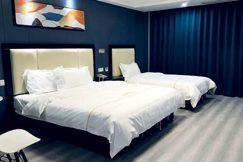 Saijia Hotel (Rugao Rt Mart)