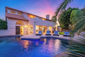 A heated pool, pool loungers