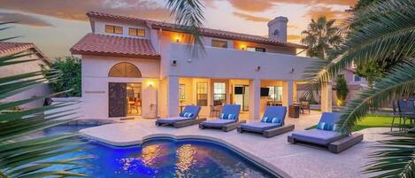 A heated pool, pool loungers