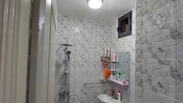 Combined shower/bathtub