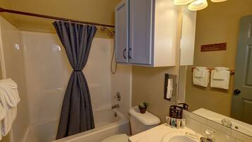 Combined shower/bathtub, hair dryer, towels, soap