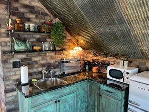 Fridge, microwave, coffee/tea maker, toaster