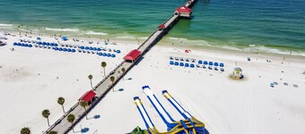 4-Bed Coastal Retreat: Heated Pool, 200 Steps to Beach, Walk to Fun!