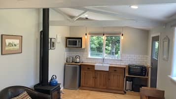 Microwave, stovetop, coffee/tea maker, electric kettle