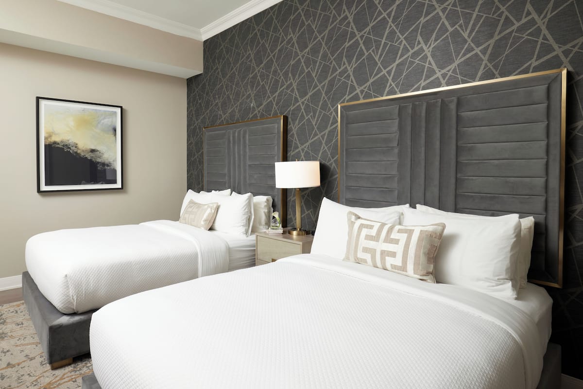 Hypo-allergenic bedding available, down comforters, in-room safe