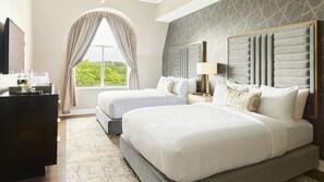 Hypo-allergenic bedding, down duvets, in-room safe