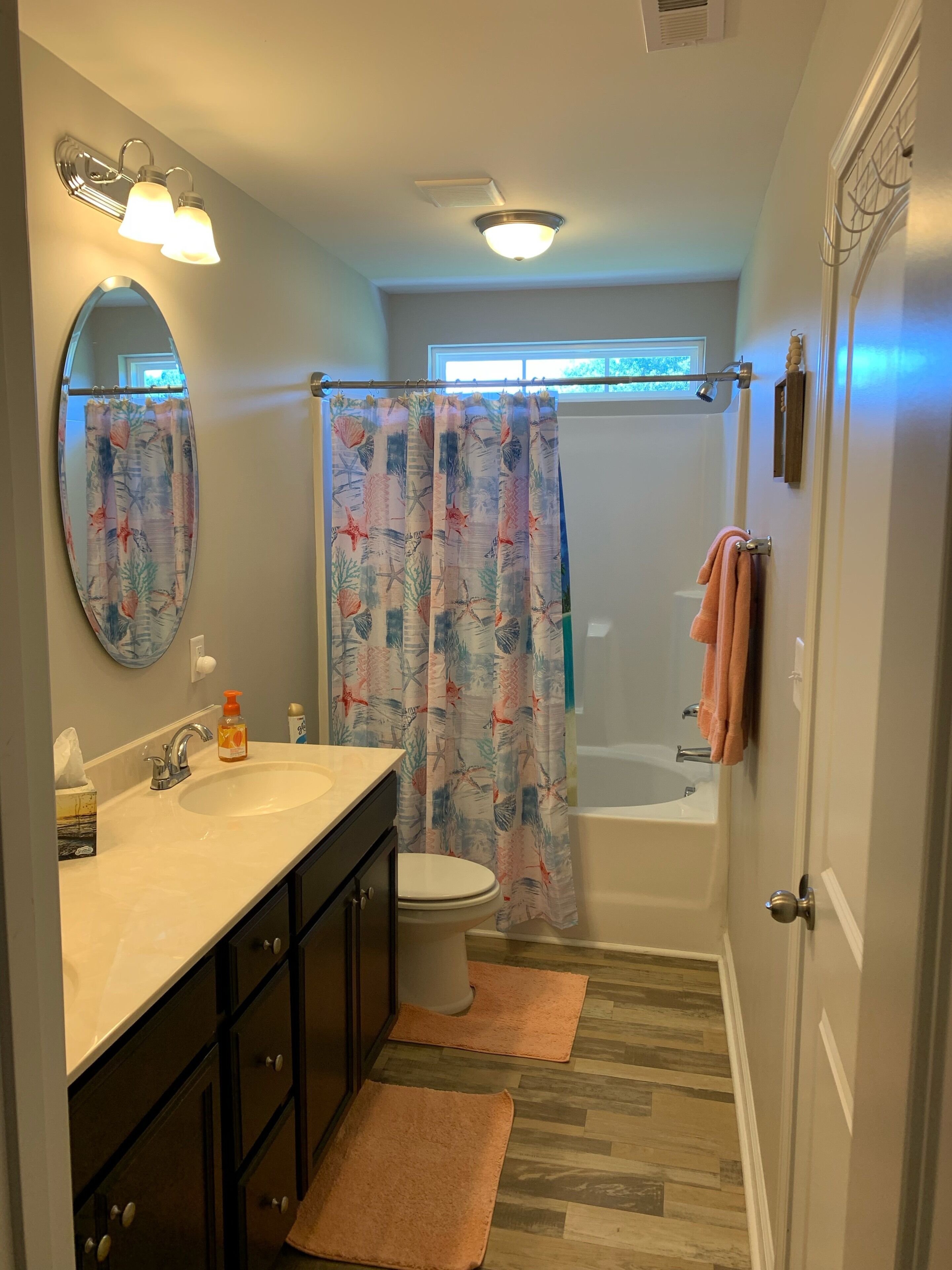 Combined shower/bathtub, hair dryer, towels, soap