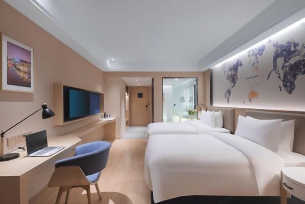 A modern hotel room with a bed, desk, chair, and a large wall map. - Kyriad Marvelous Hotel (Suzhou Wujiang People's Square) (Suzhou)
