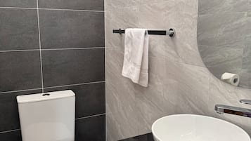 Comfort Twin Room | Bathroom | Shower, hair dryer, towels, soap