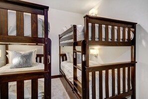 5 bedrooms, premium bedding, iron/ironing board, travel cot