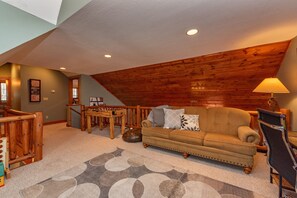 Smart TV, fireplace, foosball