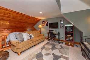 Smart TV, fireplace, foosball