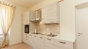 Apartamento Deluxe | Zona de estar