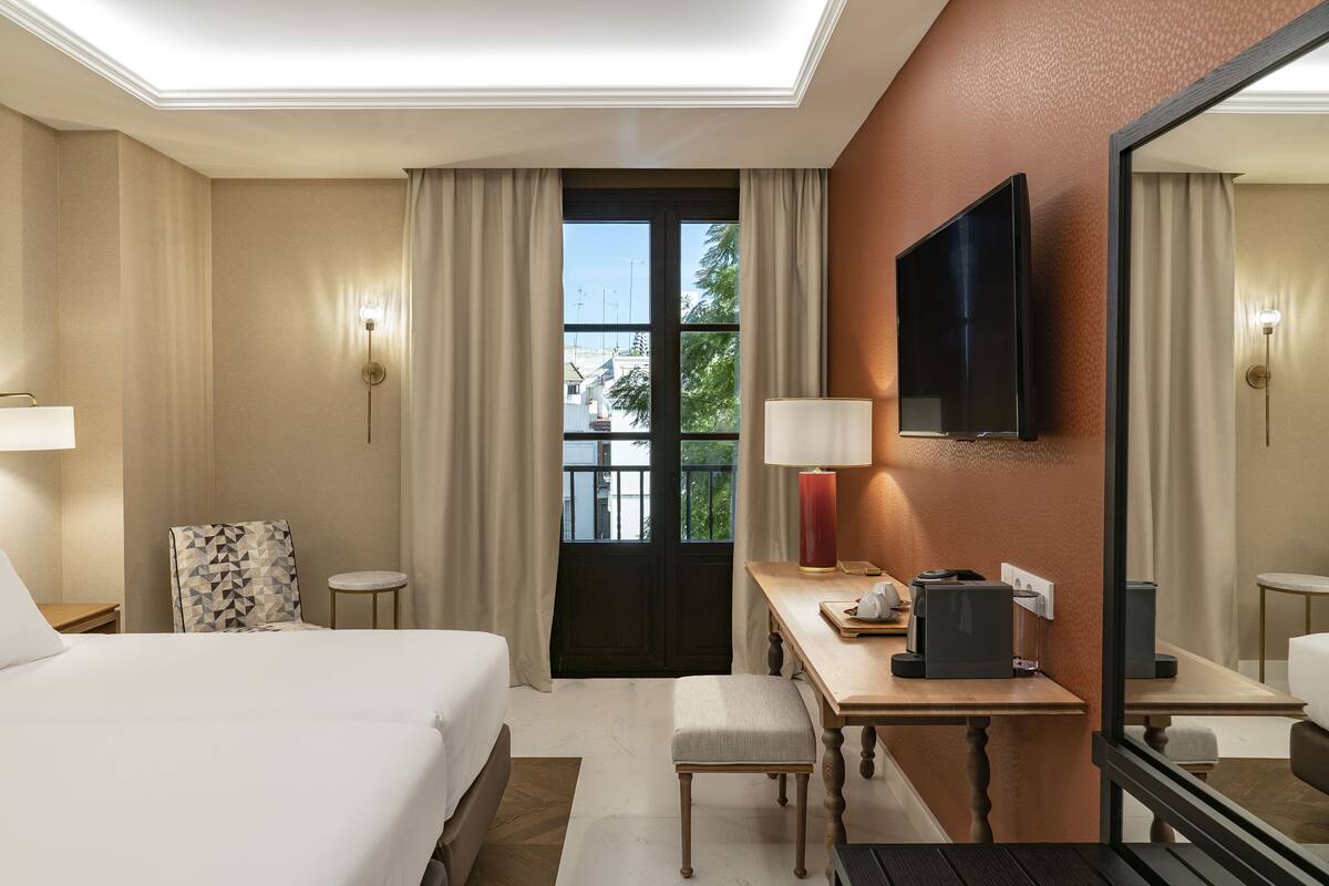 Premium bedding, down comforters, minibar, in-room safe