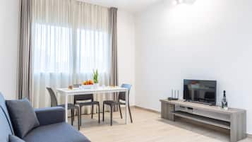 40-inch flat-screen TV with digital channels, TV