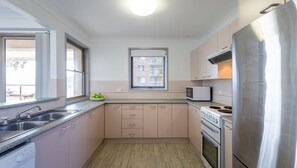 Fridge, microwave, oven, stovetop - Port Views on Ronald, 2/36 Ronald Ave (Shoal Bay)
