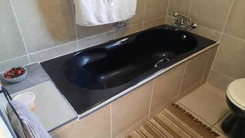 Toalhas de banho, papel higiênico