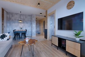 Apartamento exclusivo | Sala de estar | Una televisión LCD