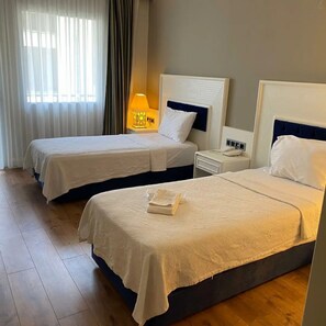 Luxe beddengoed, een kluis op de kamer, een laptopwerkplek, gratis wifi