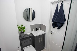 Shower, free toiletries, hair dryer, towels