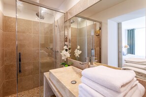 Bathtub, hair dryer, towels, soap