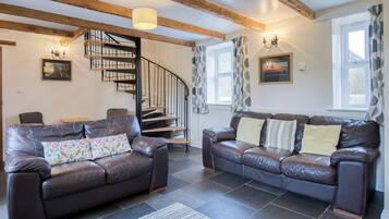 32-inch flat-screen TV with cable channels, TV