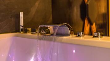 Jetted bath, hair dryer, towels, soap