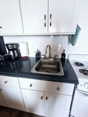 Fridge, microwave, coffee/tea maker, cookware/dishes/utensils - Unit 502 - Beachfront 1 King Bedroom 1 Bath - Sleeps 6 (Daytona Beach Shores)