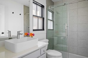 Bathtub, hair dryer, towels