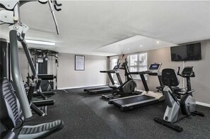 A gym with treadmills, elliptical machines, and weight equipment. - "Rip Tide" (2 Bed / 2 Bath) - 1465sqft Amalfi C121 (Miramar Beach)