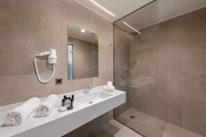 Deluxe Room | Bathroom | Shower, rainfall showerhead, free toiletries, hair dryer - Ixia Dream adults only (Rhodes)