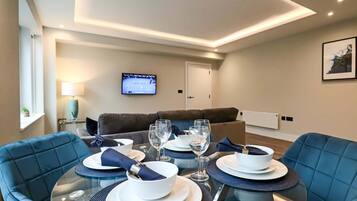 24-inch flat-screen TV with cable channels, TV
