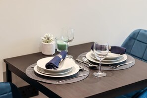 24-inch flat-screen TV with cable channels, TV - Portfolio Apartments- Welwyn Town Centre (Welwyn Garden City)