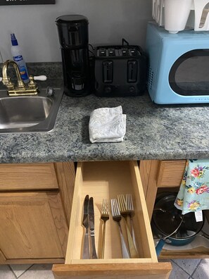 Fridge, microwave, coffee/tea maker, toaster