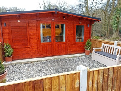 Cosy Log Cabin. Perfect for short stop overs and weekends away.