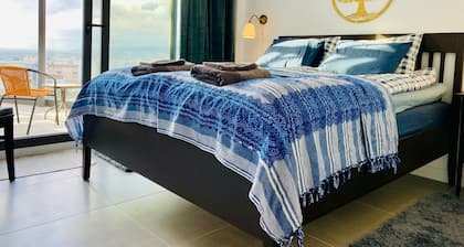 Newly built, at the top with large terraces and sea views