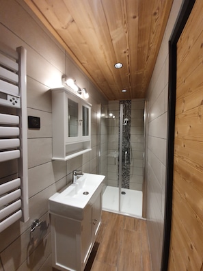Shower, free toiletries, hair dryer, towels