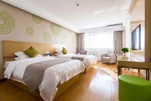 A hotel room with two beds, a desk, a chair, and a large window with curtains. - GreenTree Inn (Suzhou Si County Luanhe Avenue) (Si County)