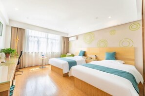 A hotel room with two beds, a desk, a chair, and a window with curtains. - GreenTree Inn (Suzhou Si County Luanhe Avenue) (Si County)