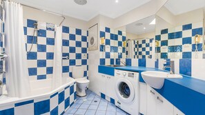 Combined shower/tub, toilet paper