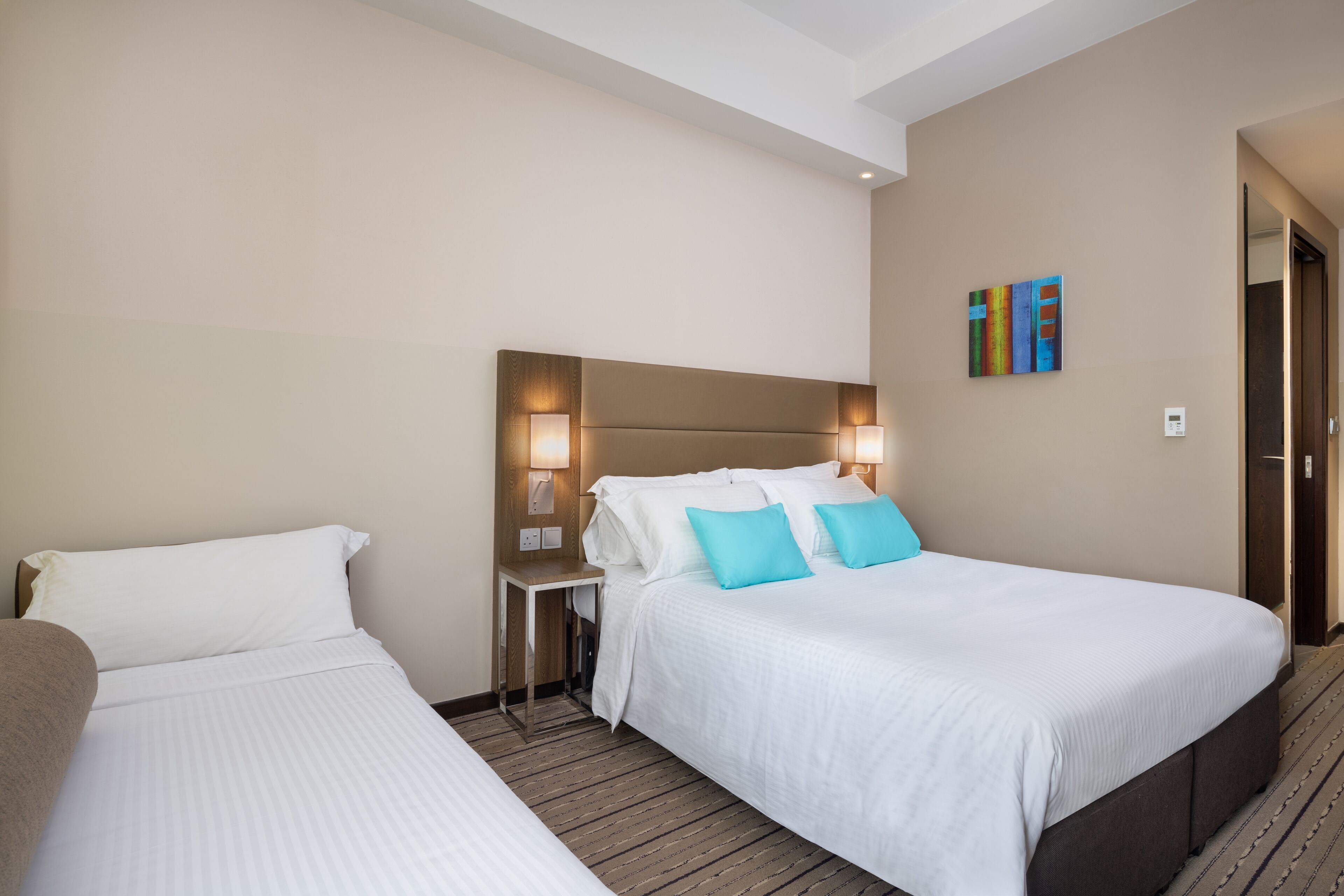 triple room | in-room safe, desk, laptop workspace, blackout curtains