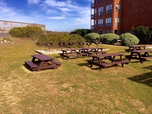 Picnic tables and grills available as well as a large grassy area for play