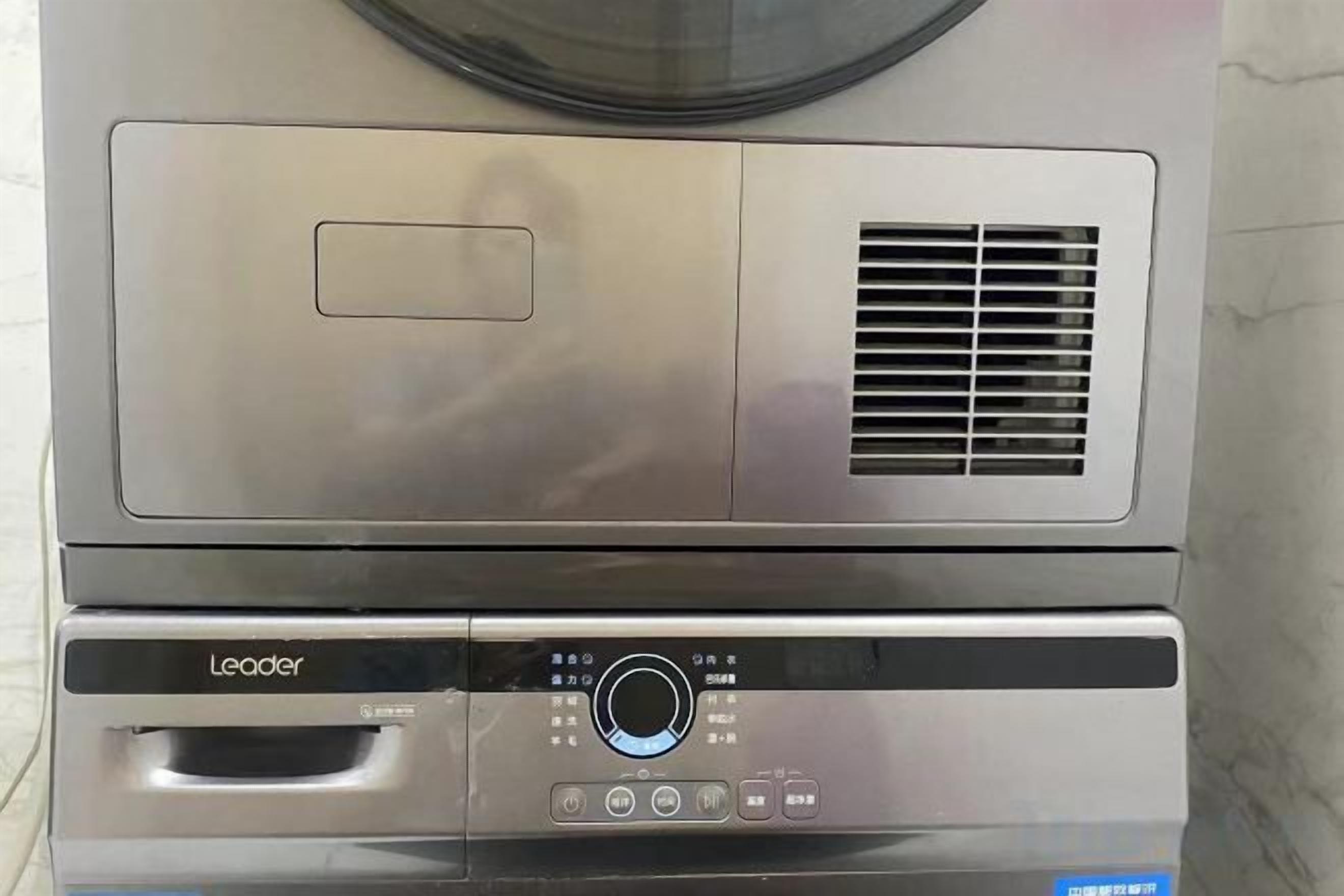 A stainless steel appliance with a control panel, likely a kitchen appliance.