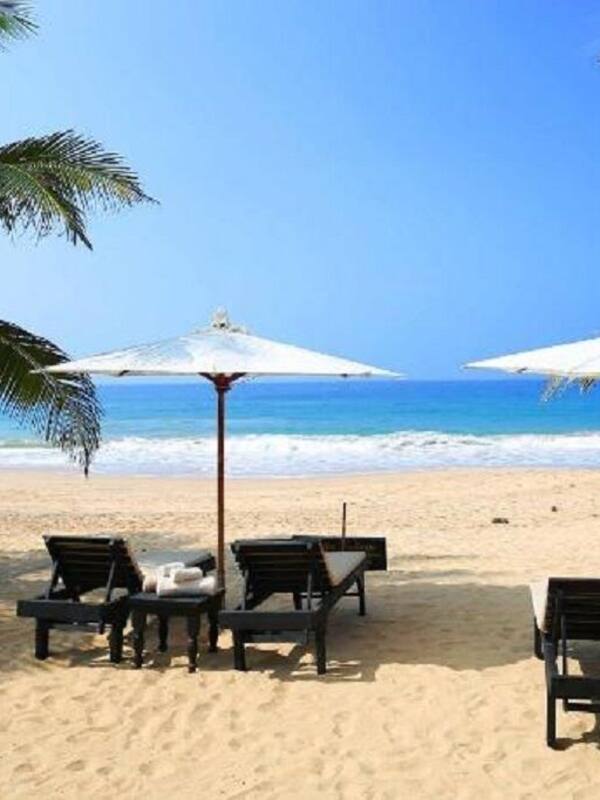 On the beach, sun loungers, beach towels