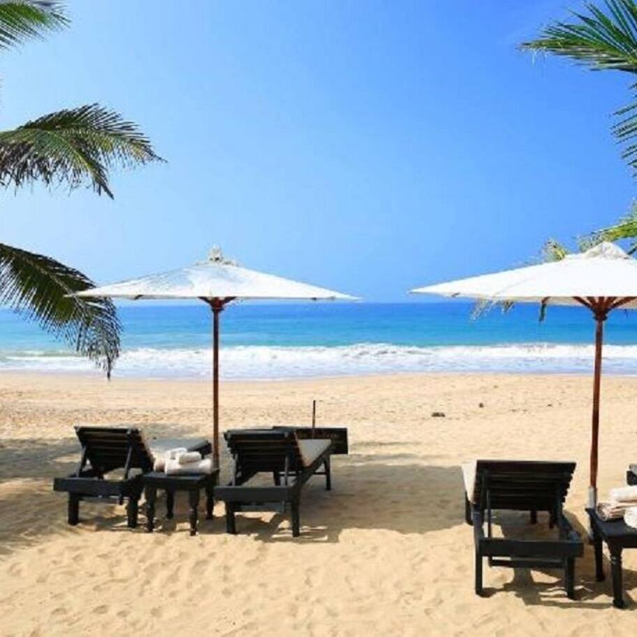 On the beach, sun loungers, beach towels