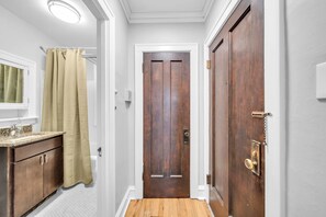 Combined shower/bathtub, hair dryer, towels, soap