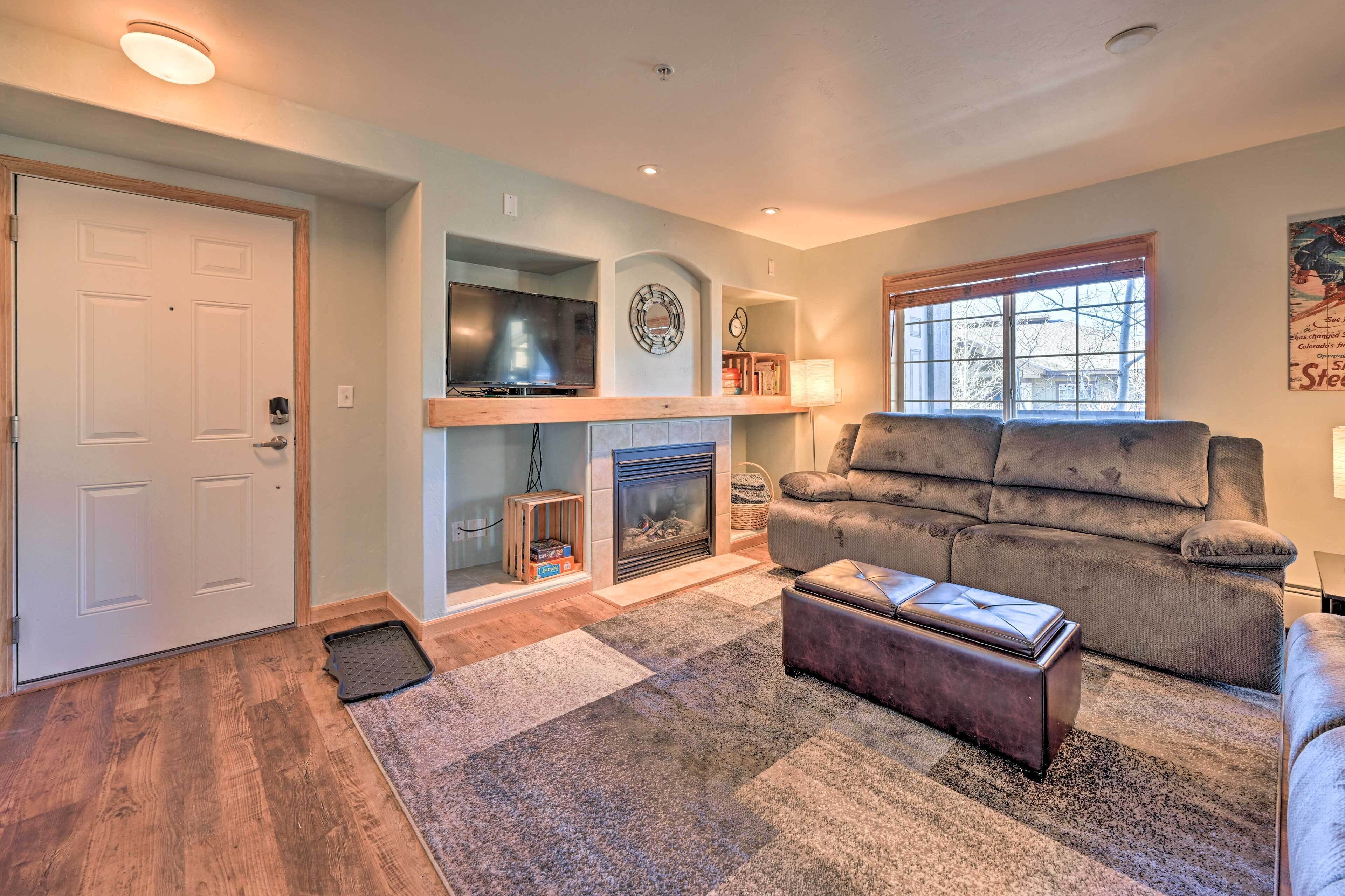 TV, fireplace, books